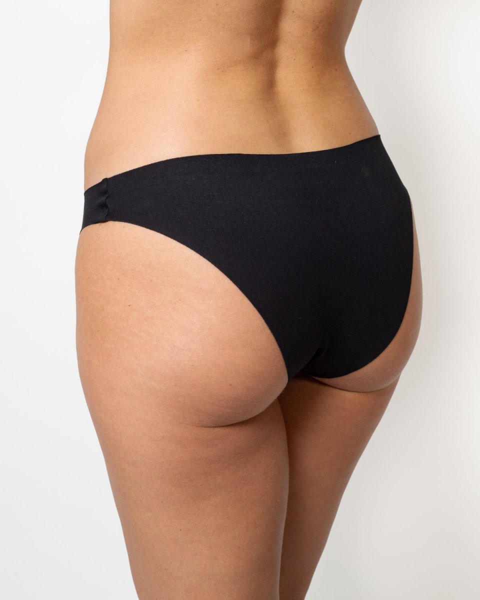 Calzón bikini invisible negro de algodón Ultraflex, Única Lingerie: vista trasera